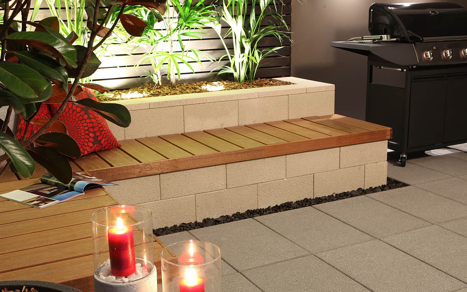a patio with a bench and candles